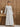 Ivory Luxe Smocked Floral Maxi Dress